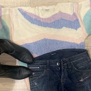 The notebook colorful vintage sweater unique and is  new.